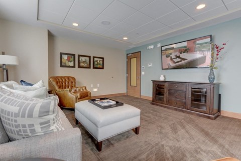Living room with TV at The Legends at Silver Lake Village 55+ Apartments, St. Anthony, 55421