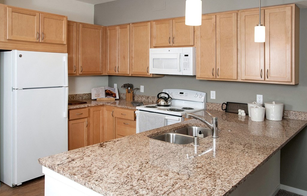 Refrigerator And Kitchen Appliances at The Legends of Columbia Heights 55+ Living, Columbia Heights, Minnesota