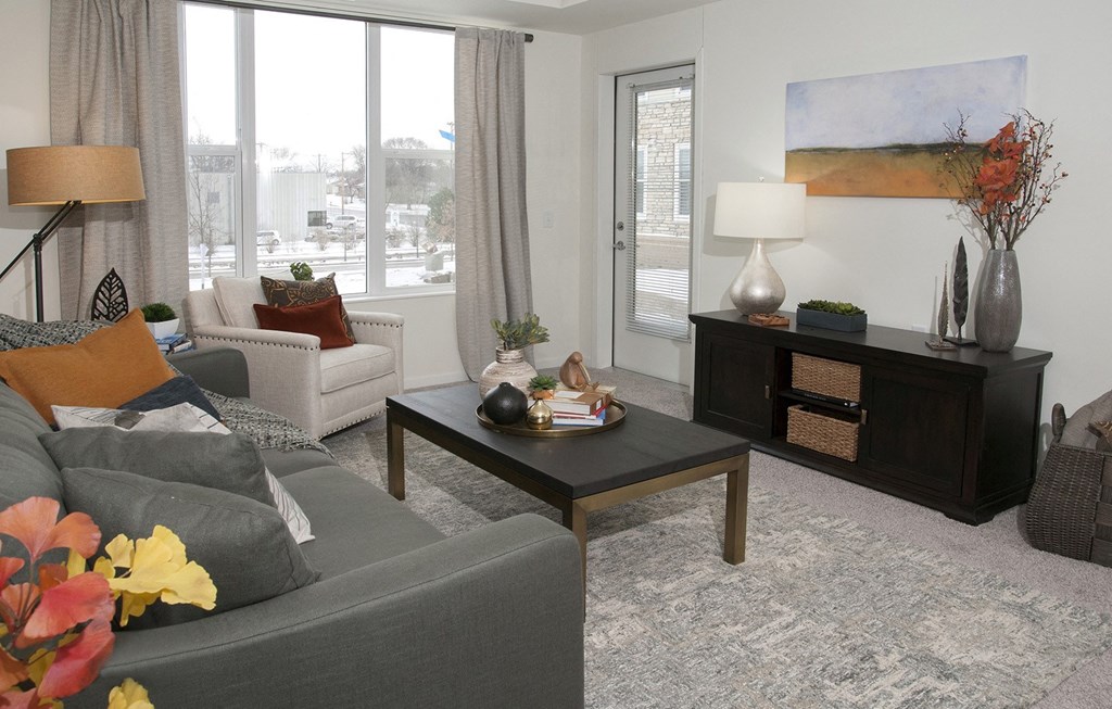 Living Room With Large Window at The Legends of Columbia Heights 55+ Living, Minnesota