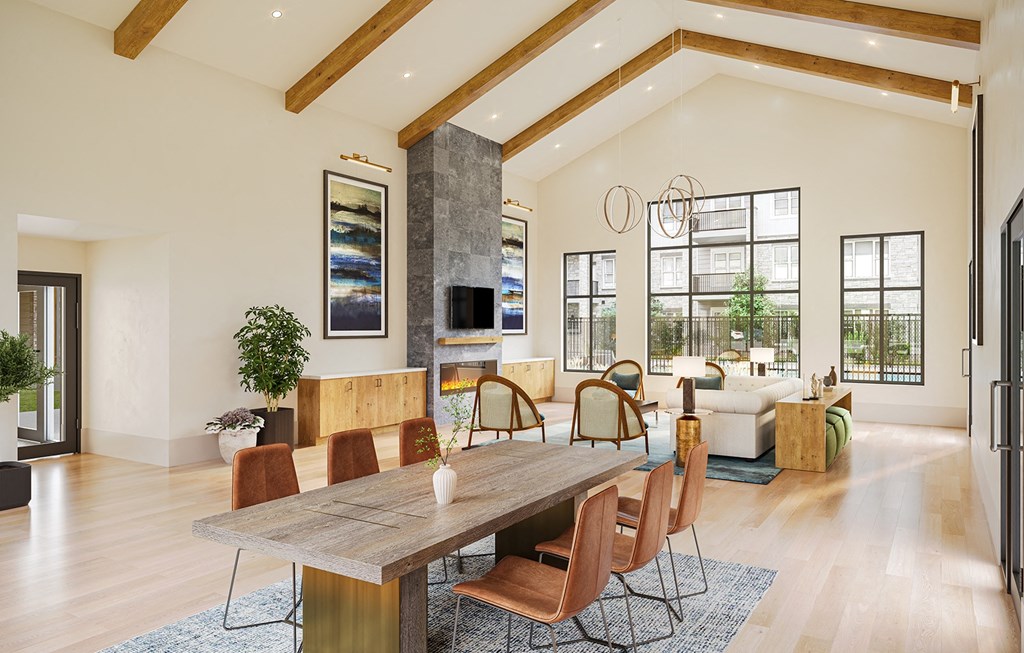 a large dining room with a wooden table and chairs