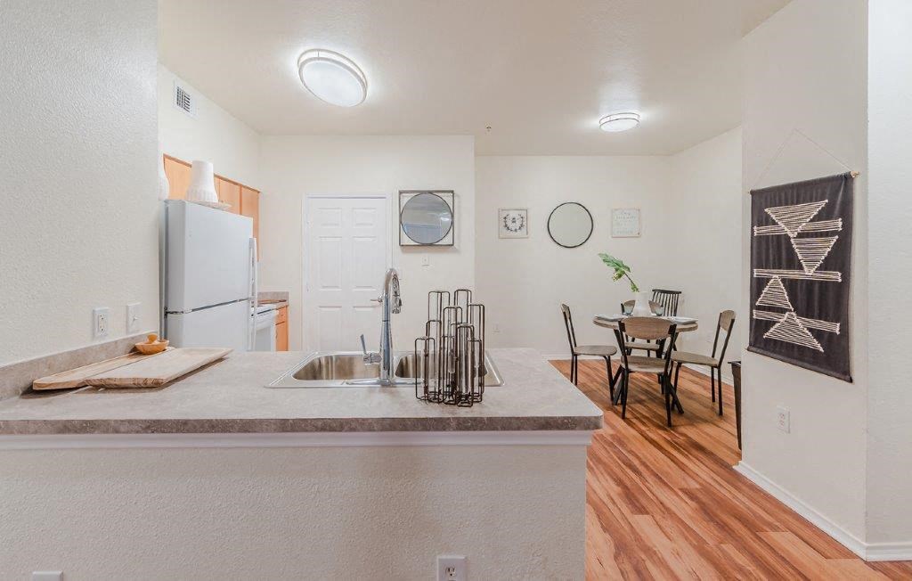 Dominium-Riverstation-New Model Kitchen and Dining Room at Riverstation, Texas