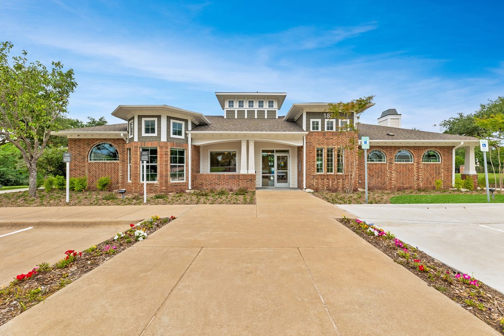 Dominium-SandyCreek-ExteriorClubhouse Dominium-SandyCreek-ExteriorClubhouse at Sandy Creek Apartments, Bryan, Texas