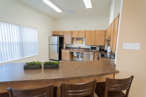 a kitchen with a granite counter top and