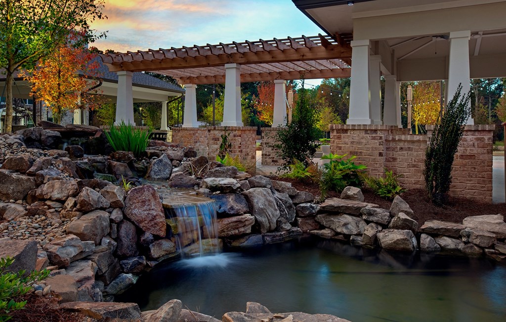 Building with pond at Stonepointe 55+ Apartments, Lithonia 30058