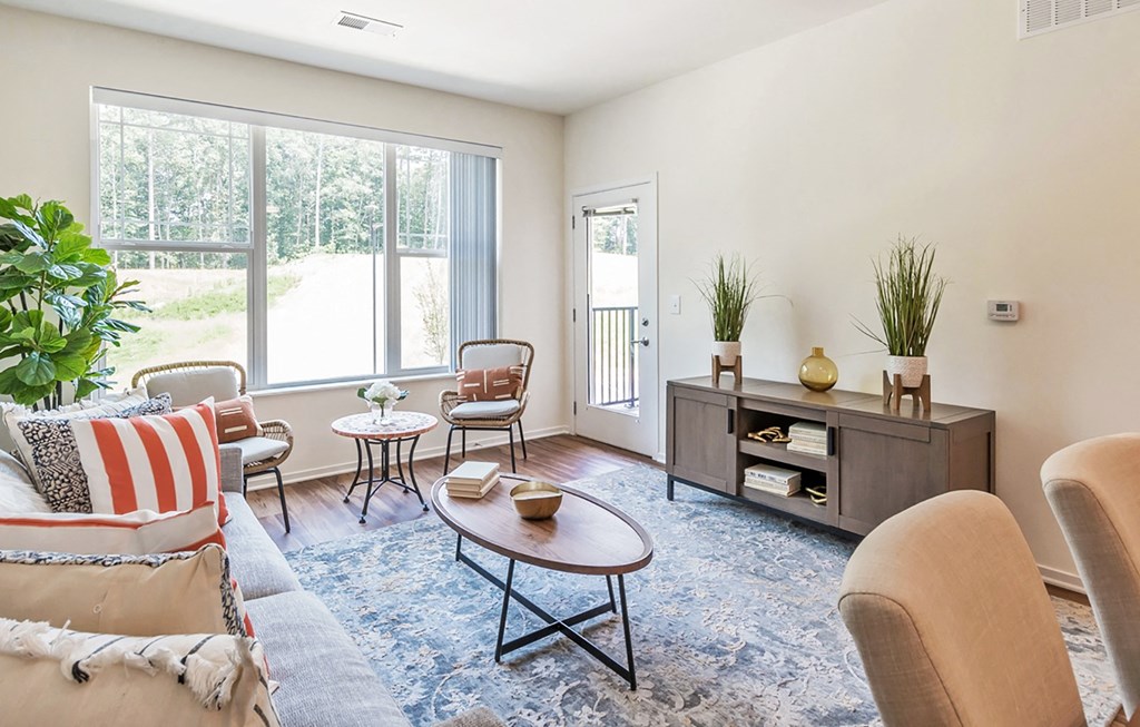 Living Room at Stonepointe 55+ Apartments, Lithonia 30058
