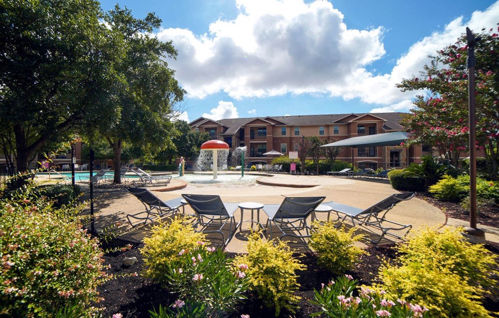 Poolside Relaxing Chairs at Stoneridge Apartments, Texas, 78660