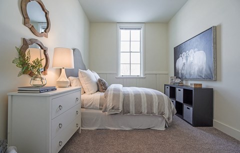 Bedroom With TV at Upper Post Flats, Fort Snelling Minnesota