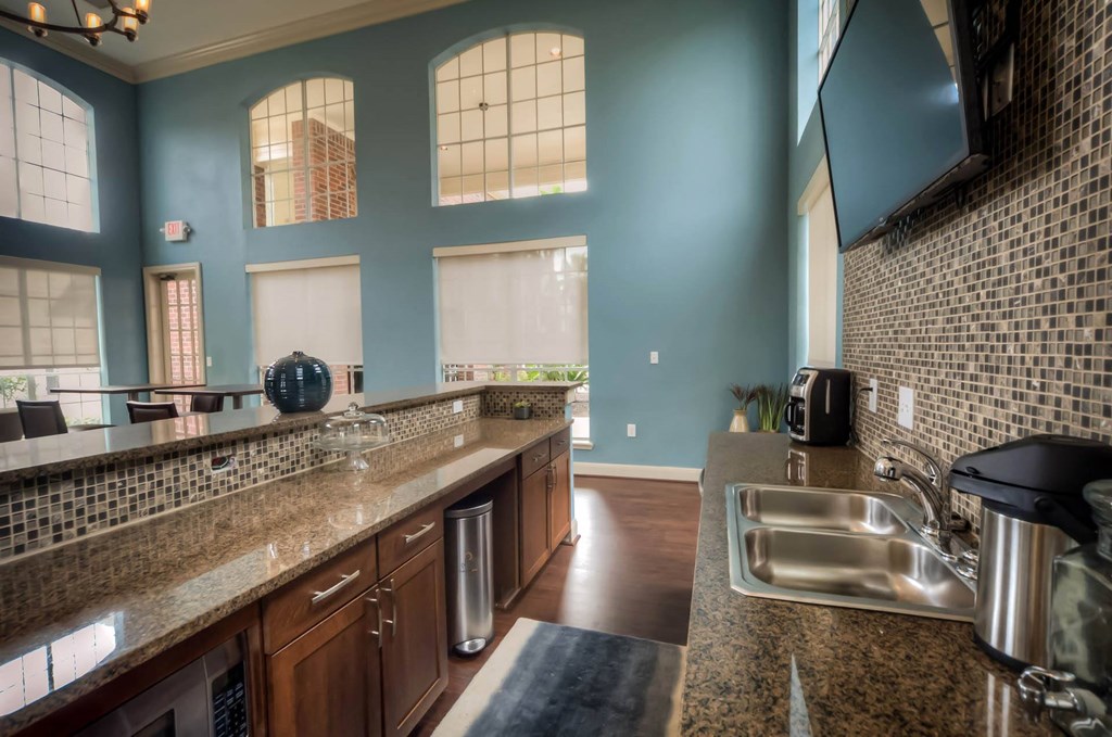 Community Room with TV at Villa Springs, Houston, TX