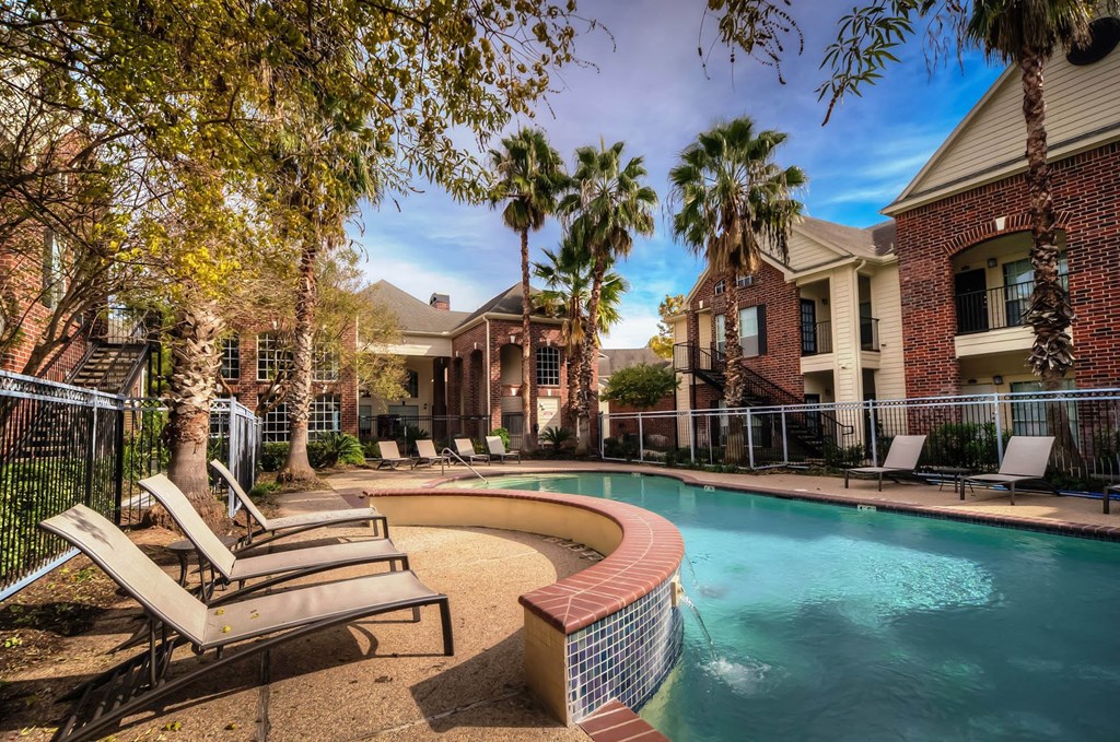 Pool With Relaxing area at Villa Springs, Houston, Texas