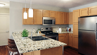 Staged Apartment Home Kitchen 900 at Cleveland Park_Staged Apartment Home Kitchen - Photo Gallery