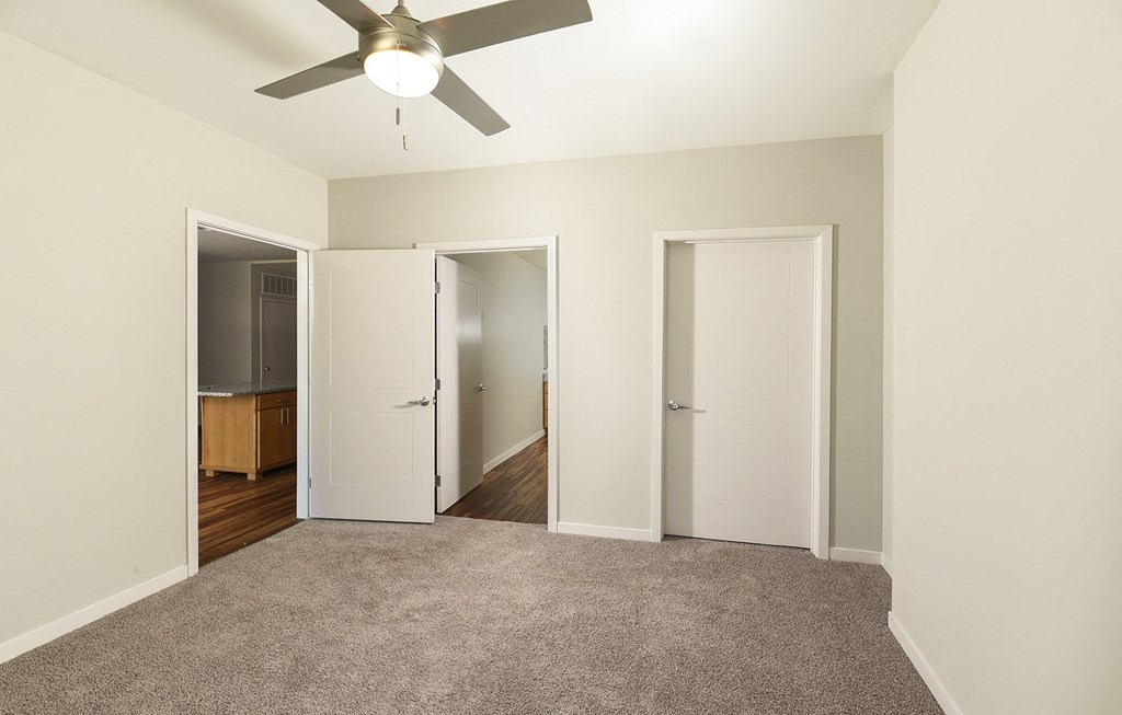 Bedroom with ceiling fan at 900 at Cleveland Park Apartments, Nashville, TN, 37207