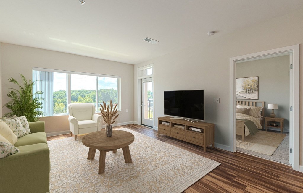 Living Room With TV at Briar Park 55+ Apartments, Georgia, 30331