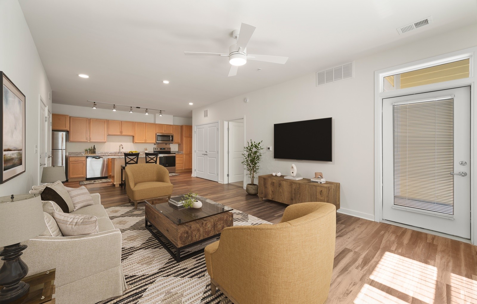 A living room with a brown sofa and a coffee table.