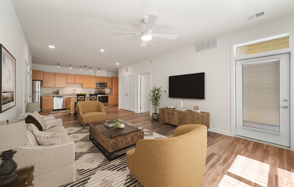 Living room with couch at Creekridge on the Park Apartments, Charlotte, NC