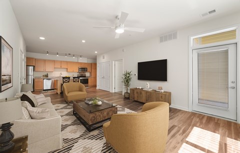 Living room with couch at Creekridge on the Park Apartments, Charlotte, NC