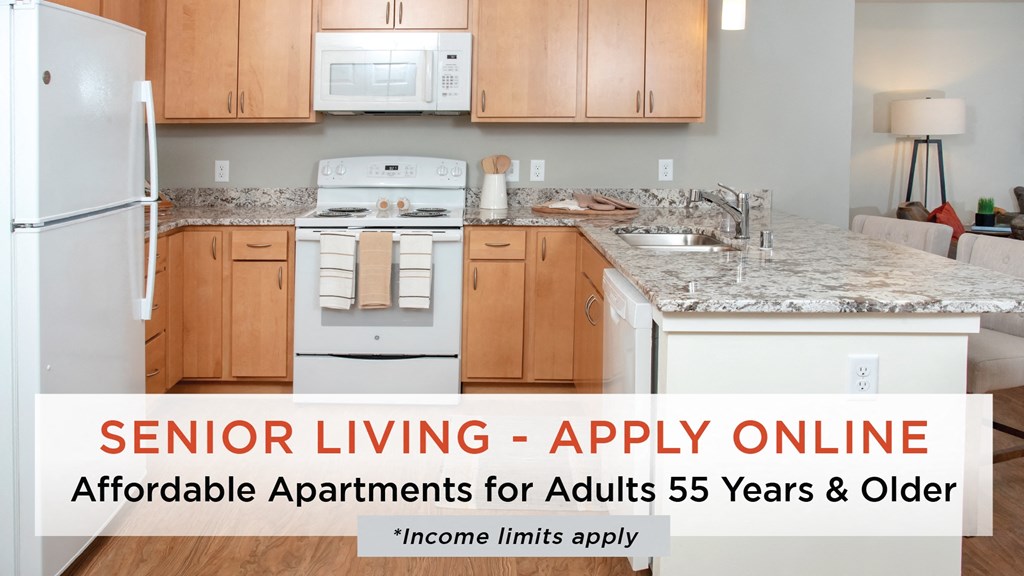 Dominium_Legends of Woodbury_Model Apartment Kitchen with Senior and Affordable Housing Banner Text