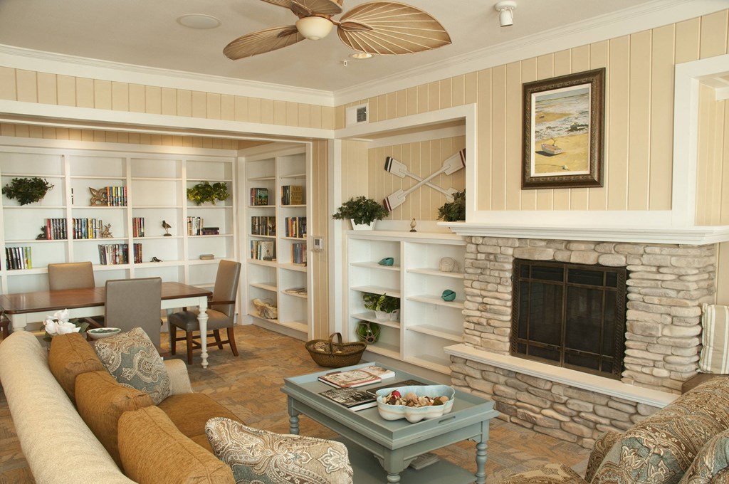 Living Room With Fireplace at Belle at Bay Colony 55+ Apartments, Dickinson