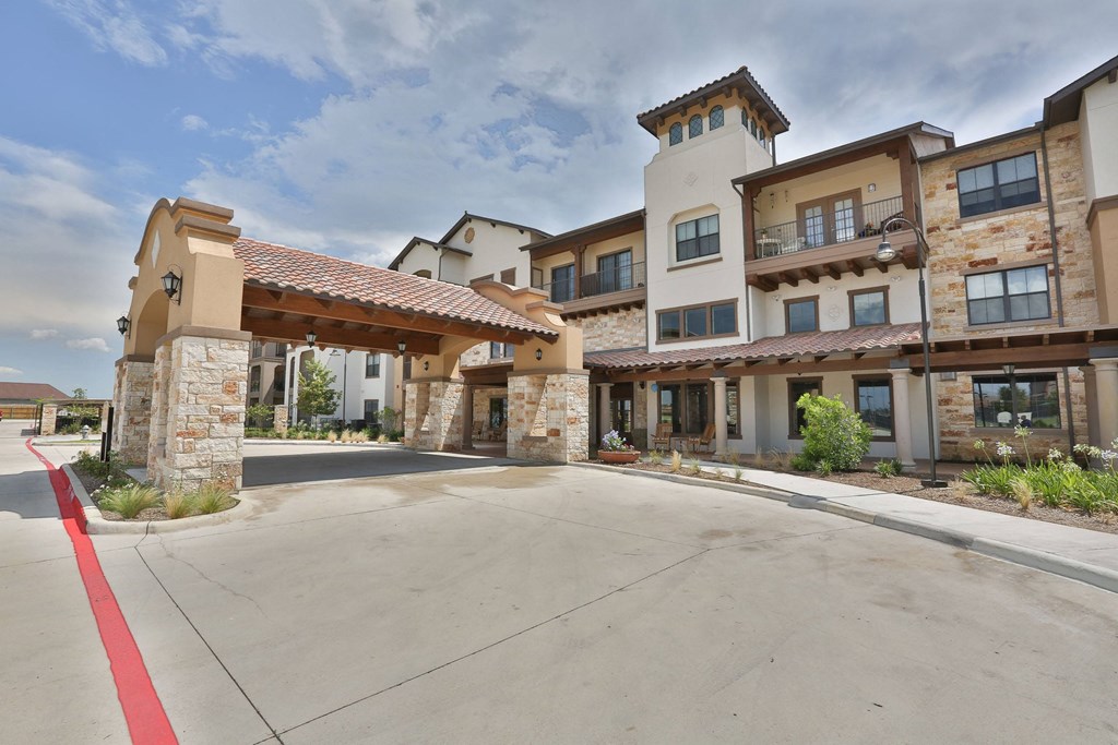 the residences at city center apartments exterior street view at Cedars of Elk Drive 55+ Apartments, Burleson, TX