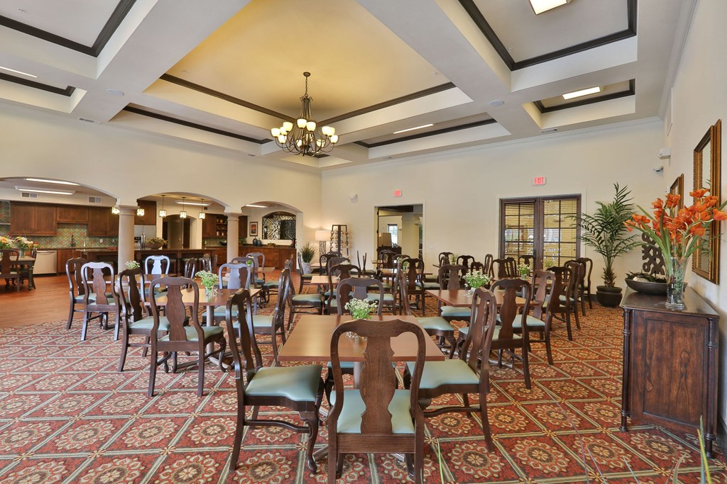 a dining room with tables and chairs in a lobby at Cedars of Elk Drive 55+ Apartments, Texas, 76028
