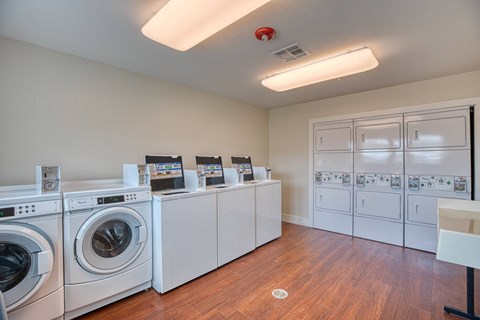 the preserve at ballantyne commons laundry room with washes and dryers at Sylvia at South Broadway 55+ Apartments, Joshua, 76058