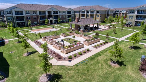 an aerial view of the courtyard at the apartments at Sylvia at South Broadway 55+ Apartments, Joshua, TX 76058