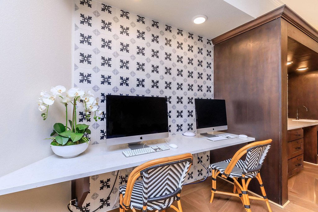 a home office with two computers and two chairs at Mariposa at Westchester, Grand Prairie, 75052