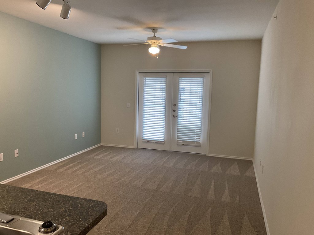 Carpeted Living Area at Pacana Park 55+ Apartments, La Porte, 77571