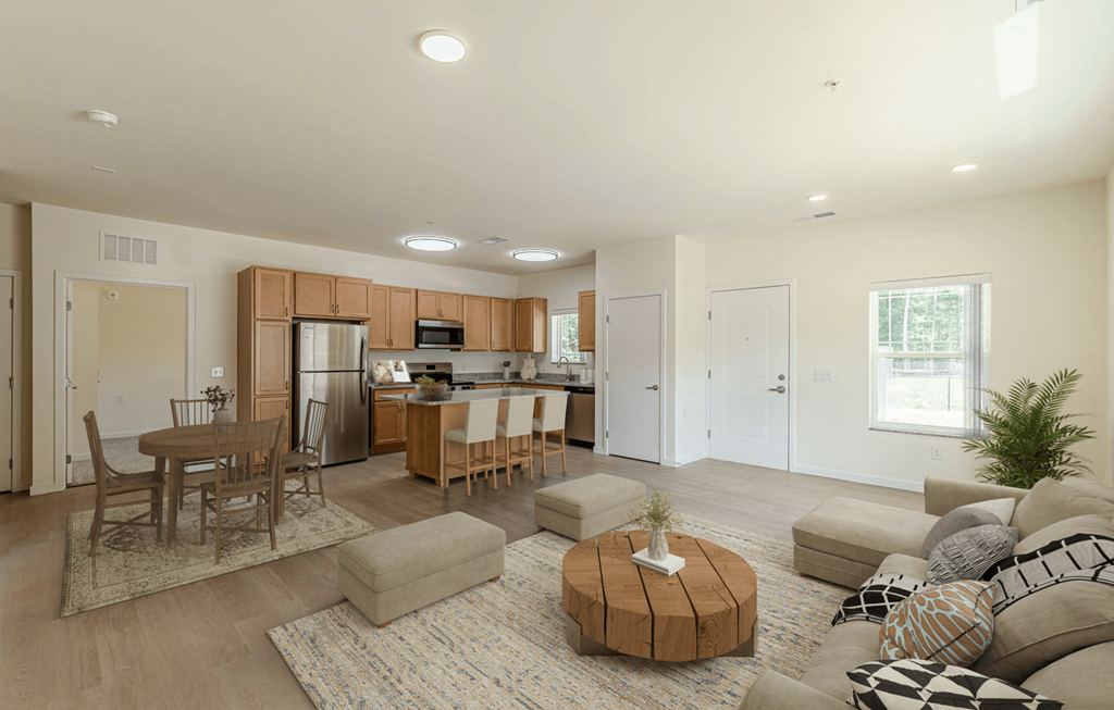 Living Area With Kitchen View at Shannon Reserve 55+ Apartments, Georgia