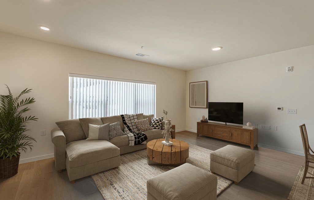 Living Room With TV at Shannon Reserve 55+ Apartments, Union City, GA