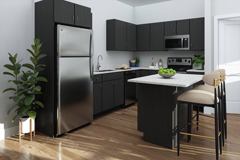 A modern kitchen with a black fridge and wooden floors.