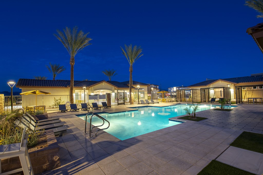View of pool at night at The Safford Apartments, Marana