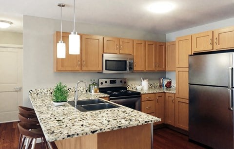 Granite Countertop Kitchen at Willow Place 55+ Apartments, McDonough, GA