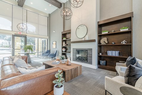 A living room with a fireplace and a couch.