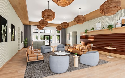 A modern living room with a grey sofa set and wooden floors.
