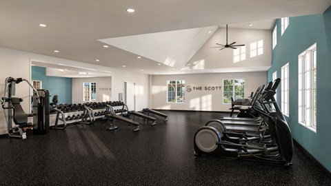 A gym with a row of treadmills and elliptical machines.