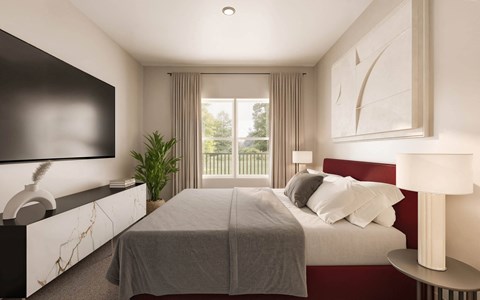 A bedroom with a large bed and a flat screen TV mounted on the wall at Sage at Franklin Park Apartment , Austin