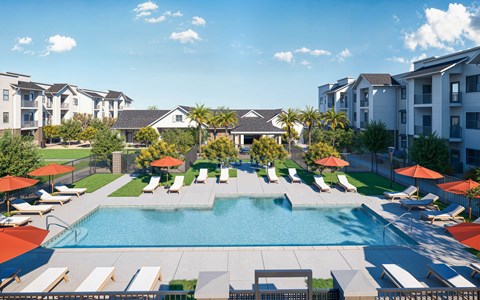 A large swimming pool surrounded by sun loungers and umbrellas at Arterra Apartment , Surprise, Arizona