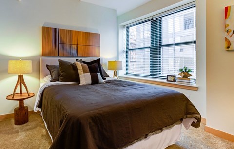 Bedroom with bed at Arcade Apartments, St Louis, MO, 63101