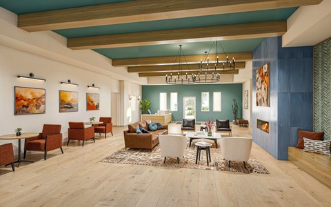 A living room with a wooden floor and a large window.