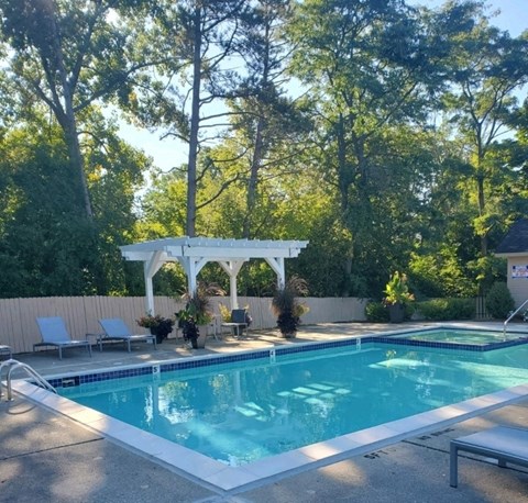 Weatherstone townhomes private pool and sundeck for resident's exclusive use.