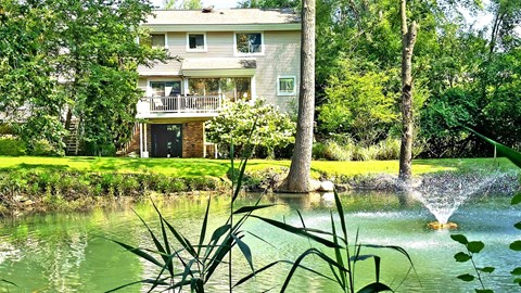 Sumptous setting for Weatherstone Townhomes includes a backyard fountain