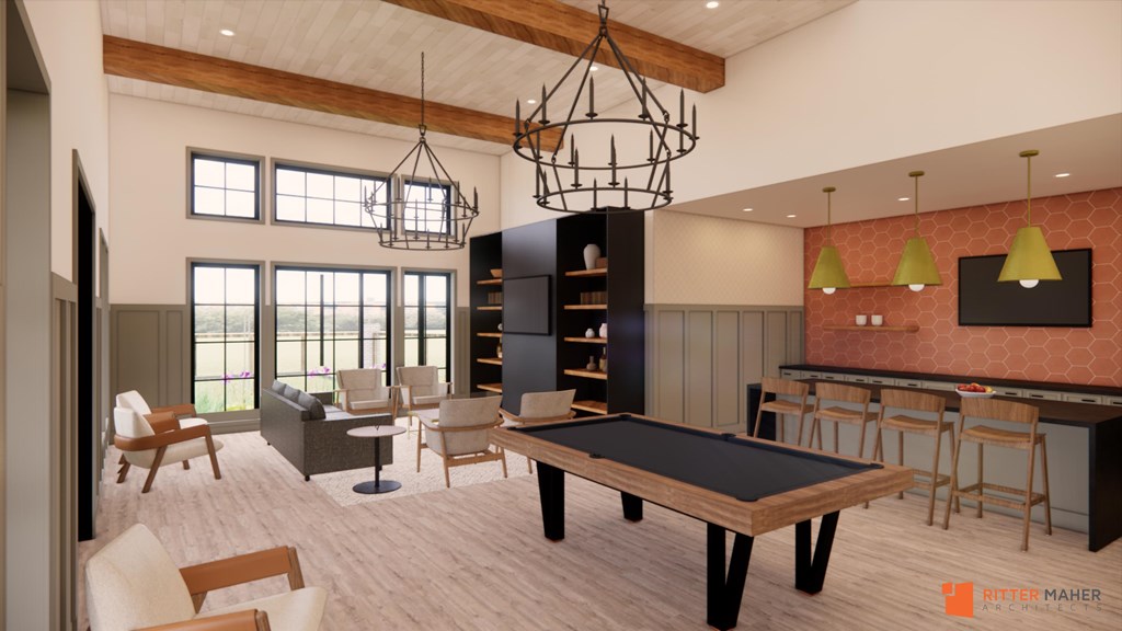 A room with a pool table and a bar area.