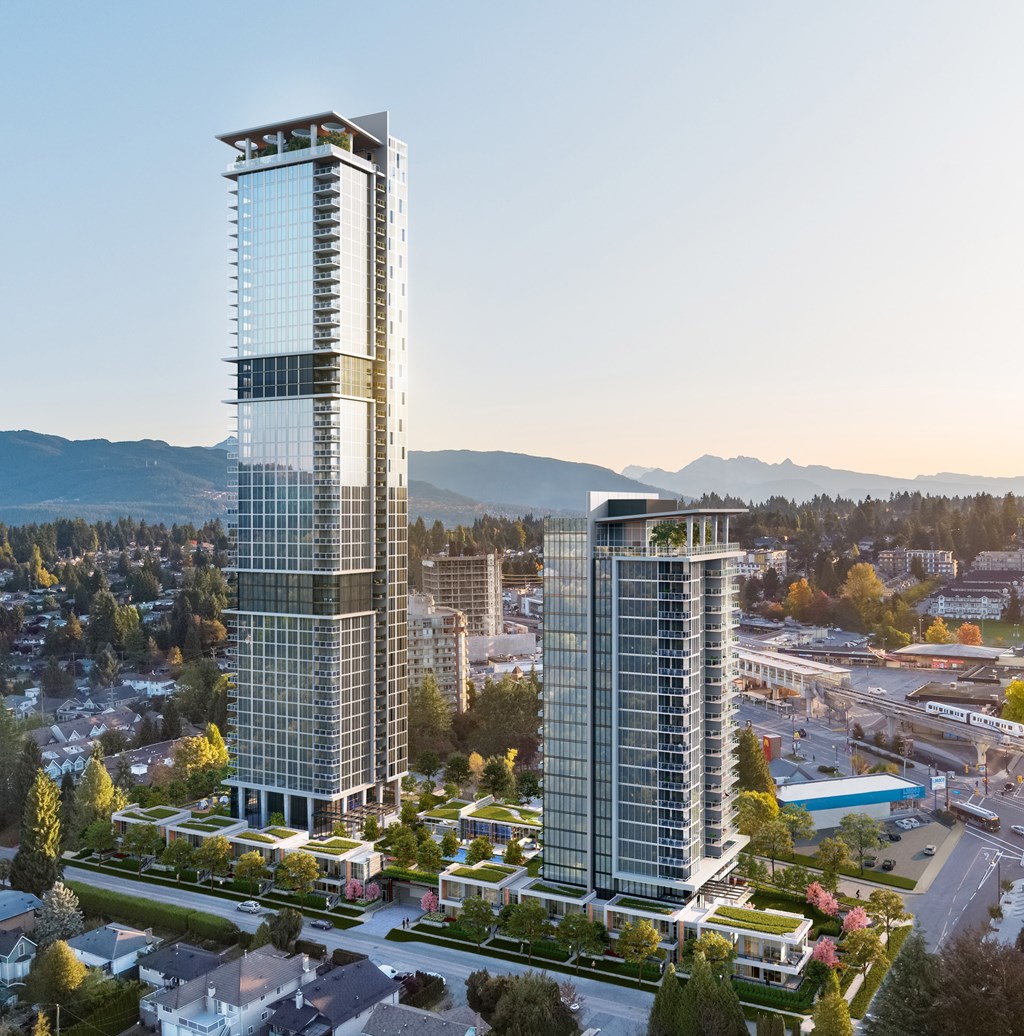 A modern skyscraper with a glass facade stands tall in a cityscape.