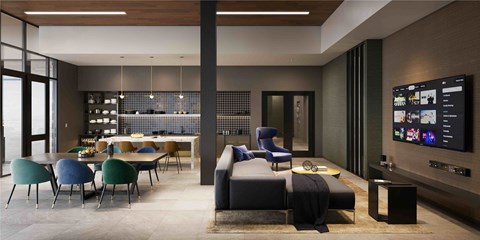A modern living room with a dining table and chairs, a sofa, and a television.