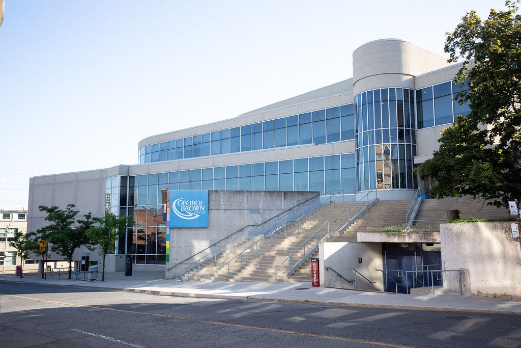 George's building with a blue sign on it.
