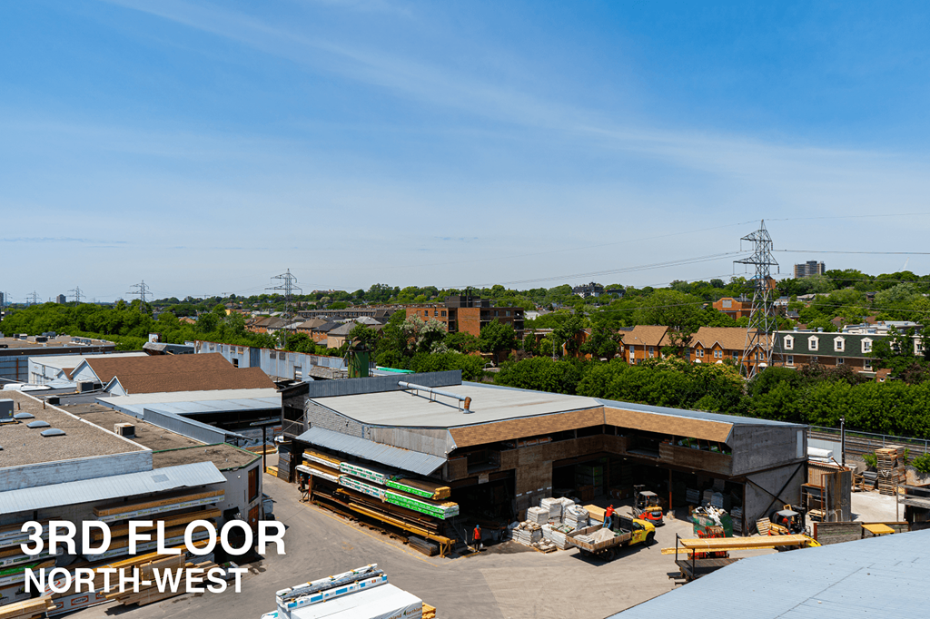 A view of the 3rd floor of a building with a clear blue sky in the background.