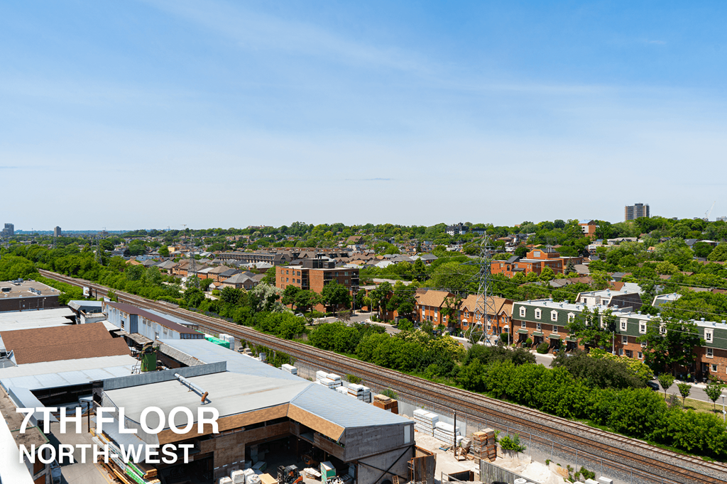 A view of a city from the 7th floor of a building.