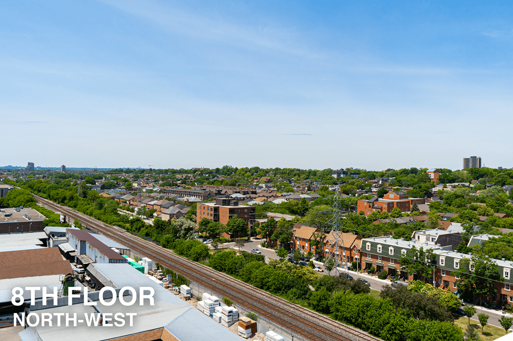 A view from the 8th floor looking northwest over a cityscape.