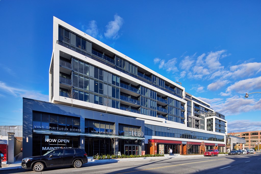 A modern building with a sign that reads