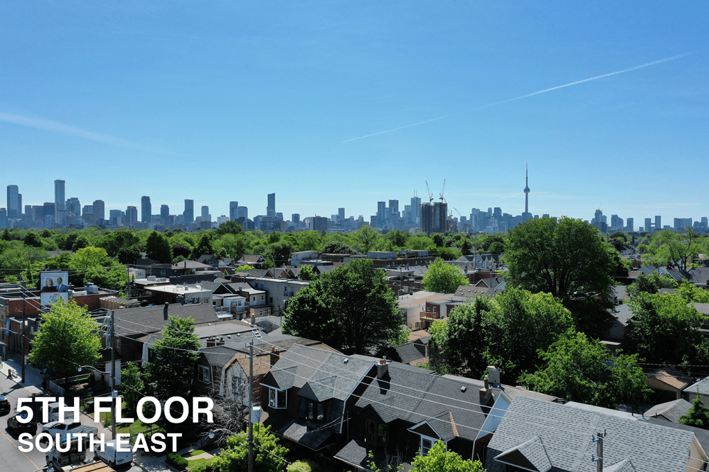 A view of a city skyline from a residential area.